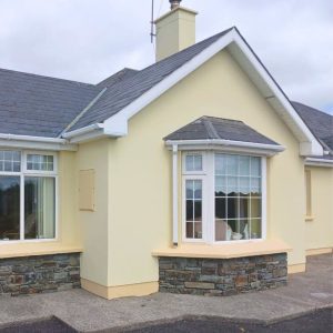 Exterior House Gable after painting cream colour and light brown windowsills
