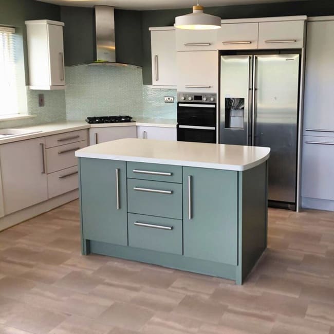 Blue kitchen island hand-painted after laminate was removed